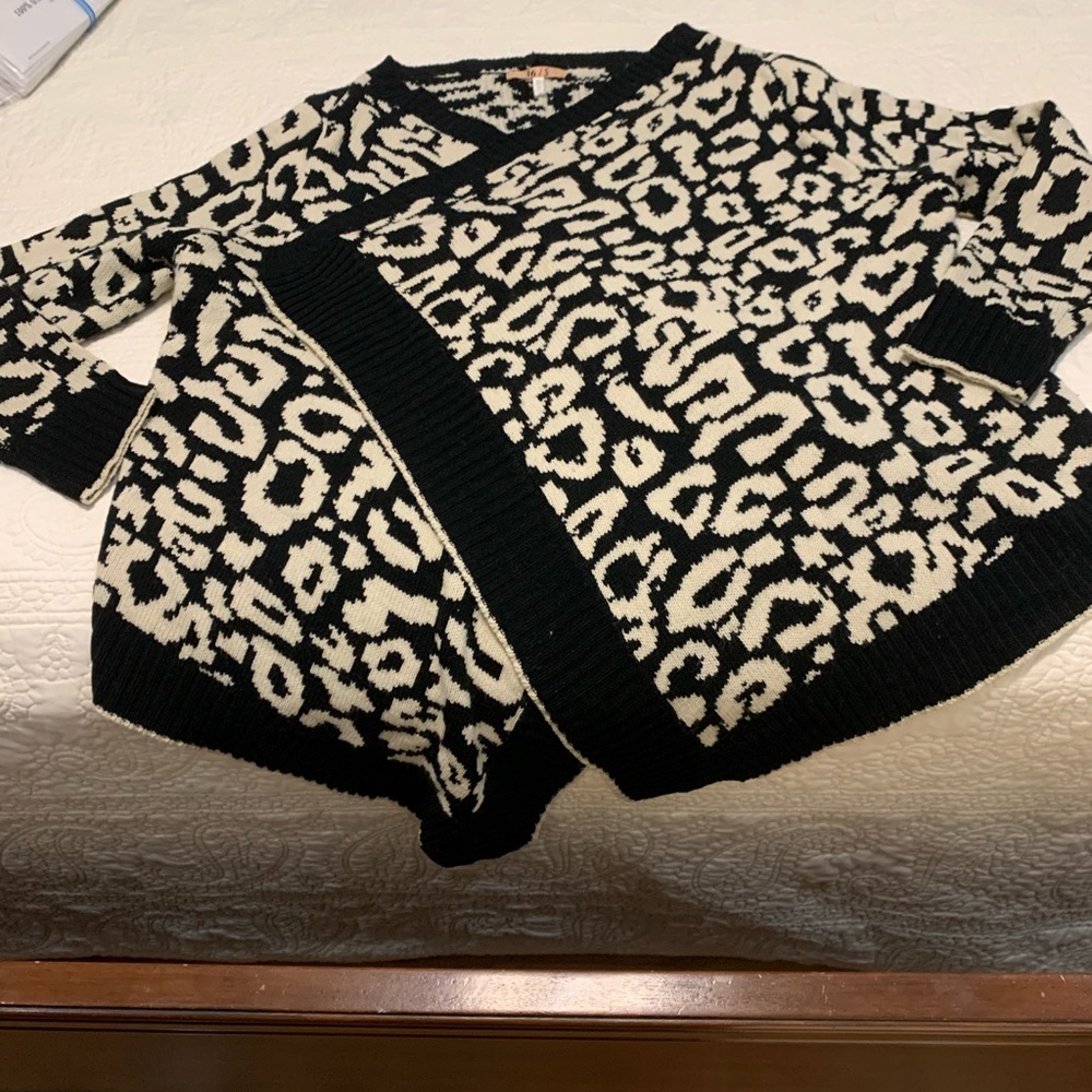 36.5 Black & White Leopard wrap around sweater. One Size fits most.